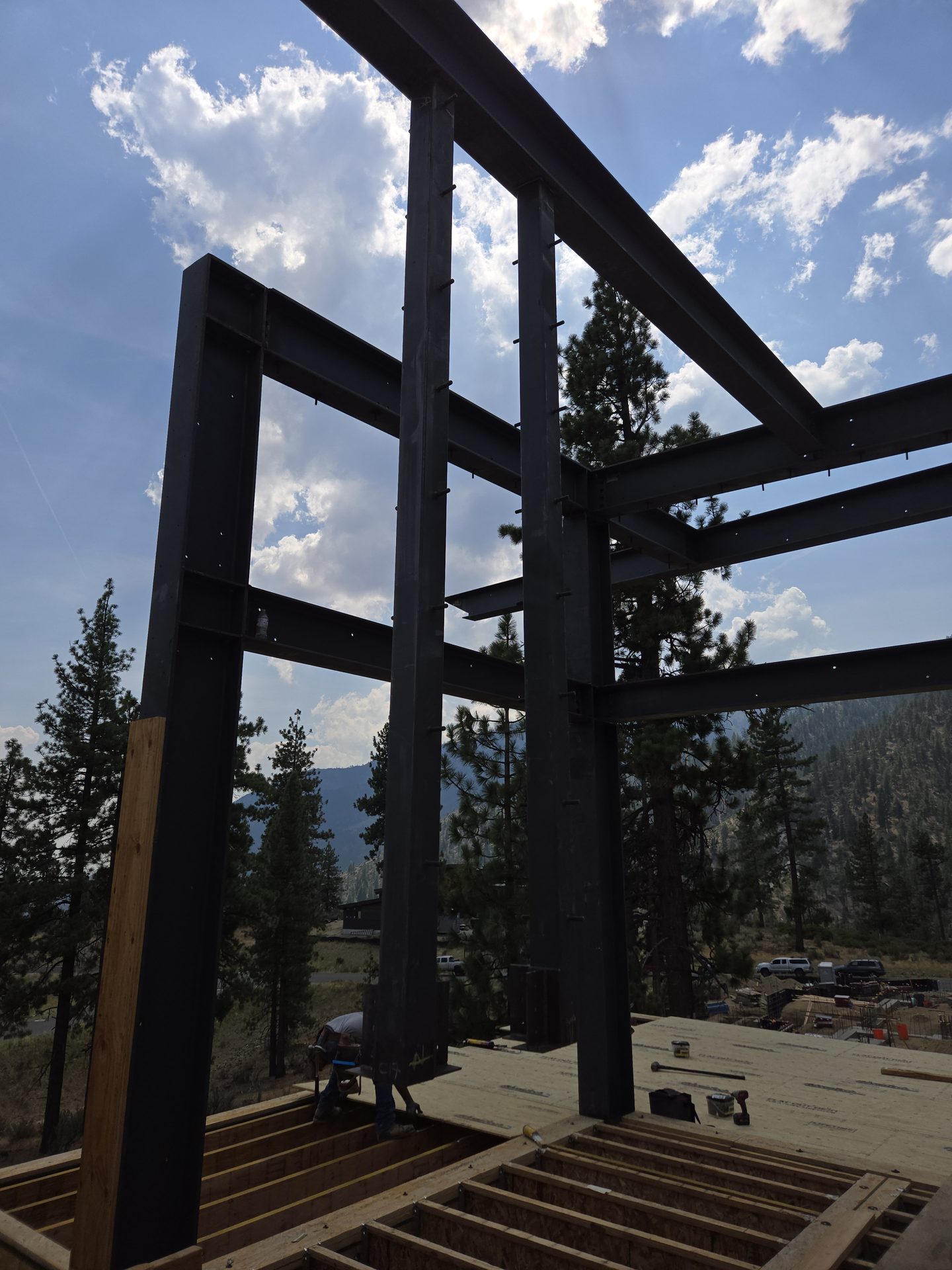 Silhouette of a custom steel moment frame against the Sierra Nevada mountains
