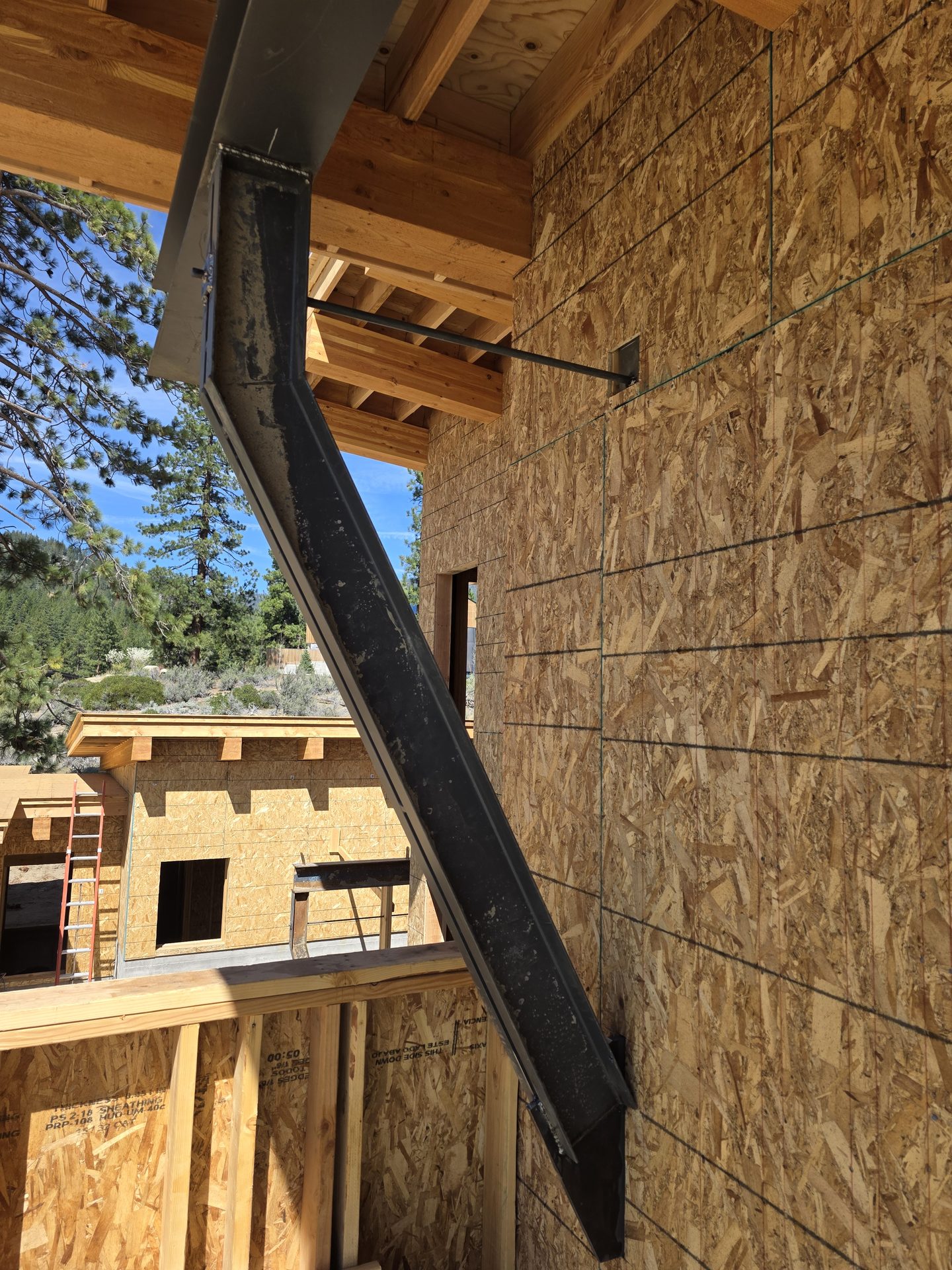 Dramatic diagonal steel kicker column at a Carson Valley custom home